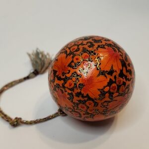 Hand-Painted Floral Russian Lacquer Ball Ornament in Orange, Black And Gold